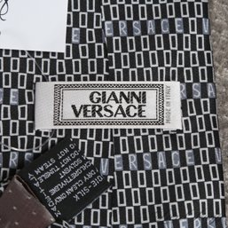#19 FATHERS DAY PERFECT! GIANNI VERSACE MADE IN ITALY BLACK / SILVER SATIN SPACED CUBES SPELLOUT LOGO SILK TIE