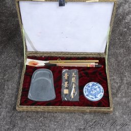 A VIRTUALLY BRAND NEW IN BOX JAPANESE CALLIGRAPHY INK SET WITH BRUSHES AND INK DISHES