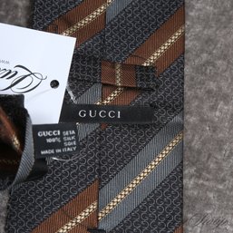 #1 NEAR MINT AND FANTASTIC GUCCI MADE IN ITALY GREY AND BROWN BLOCK STRIPE OVER GG MONOGRAM MENS SILK TIE