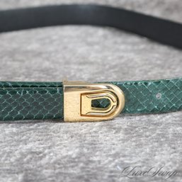 A NEAR MINT POSSIBLY UNWORN VINTAGE ADJUSTABLE LENGTH GENUINE SNAKESKIN MONEY GREEN BELT WITH GOLD BUCKLE