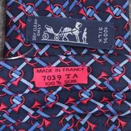 #12 NEAR MINT HERMES MADE IN FRANCE MENS NAVY SILK TIE WITH SKY BLUE AND RED FRENCH HORN MOTIF