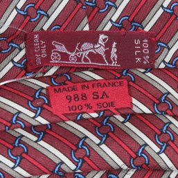 #15 CLASSIC HERMES MADE IN FRANCE MAROON MULTI STRIPE SILK TIE WITH BLUE CIRCULAR RINGS