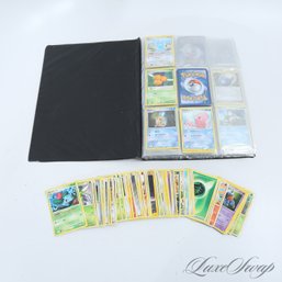 A LARGE LOT OF HUNDREDS OF POKEMON TRADING CARDS WITH ORIGINAL BINDER