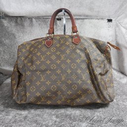 #27 A LARGE SIZE VINTAGE LOUIS VUITTON MONOGRAM 'SPEEDY' HANDBAG