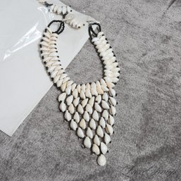 BRAND NEW UNUSED SUITE OF TWO PUKA SHELL DRAMATIC BIB NECKLACE AND EARRINGS SET