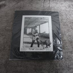 A VINTAGE AUTOGRAPHED PICTURE OF GEORGE THOROGOOD OF THOROGOOD AND THE DESTROYERS