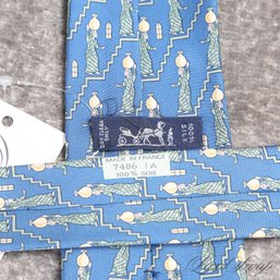 AN INCREDIBLE HERMES PARIS MADE IN FRANCE BLUE PEOPLE WALKING WITH JUGS ON THEIR HEADS SILK MENS TIE