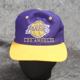 VINTAGE 1990S NBA OFFICIALLY LICENSED LOS ANGELES LAKERS SIGNATURE PURPLE AND GOLD BASKETBALL SNAPBACK HAT