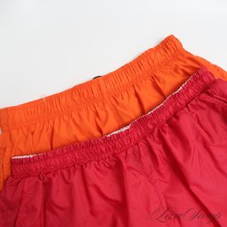 LOT OF 2 VINTAGE NIKE WHITE / BLACK TAG ORANGE AND RED WIND / WATER SHORTS MXL