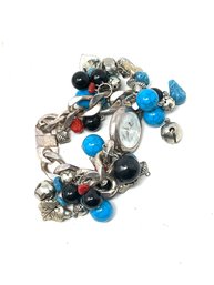 #6 JINGLE THESE BELLS! WOMENS MOUL MOP DIAL QUARTZ WATCH ON DANGLY BELL ACCENTED BRACLET