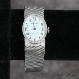 #12 A VINTAGE WALTHAM INCABLOC 17 JEWEL MANUAL WIND MOVEMENT STEEL WATCH ON METAL MESH BRACELET