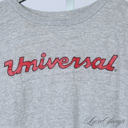 REAL DEAL VINTAGE 1980S HEATHER GREY 'UNIVERSAL' TEE SHIRT ON CHAMPION MADE IN USA TAG L