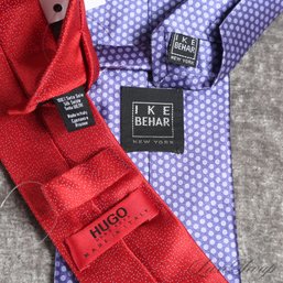 EXPENSIVE LOT OF 2 MODERN AND FRESH MENS SILK TIES BY HUGO BOSS AND IKE BEHAR IN RED AND PURPLE