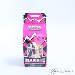 ONE BOXED SET OF POKEMON MARNIE PREMIUM TOURNAMENT COLLECTION CARDS IN A MILK CARTON SHAPED BOX