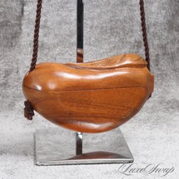 A VERY COOL AND UNUSUAL VINTAGE WOODEN CARVED BEAN SHAPED HANDBAG ON ROPE CORD HANDLE