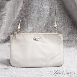 PERFECT SUMMER TRAIPSING AROUND TOWN BAG! CUTE AND RECENT COACH PINK INFUSED BEIGE CROSSBODY BAG