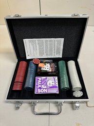 A MOSTLY COMPLETE POKER CHIP SET WITH DEALER BUTTONS, PAULSON CARDS AND MORE