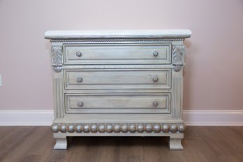 A White Beveled Marble Top Three Drawer Wooden Chest