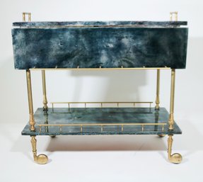 An Aldo Tura Parchment Bar Cart