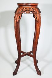 A Chinese Stone Top Carved Wood Plant Stand