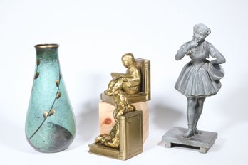 A Group Of Metal Decorative Objects