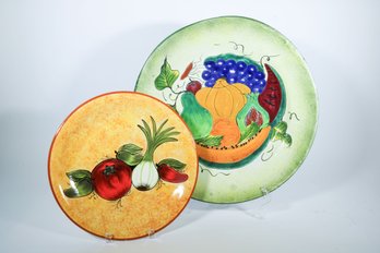 A Pair Of Terracotta Glazed Serving Platters