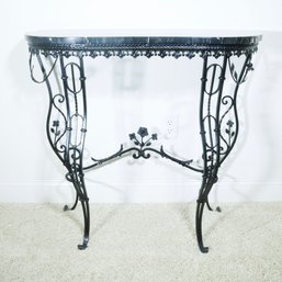 A Black Iron And Marble Console Table