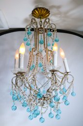 A  Murano Glass Chandelier With Crystal Swags And Aquamarine Sphere Prisms