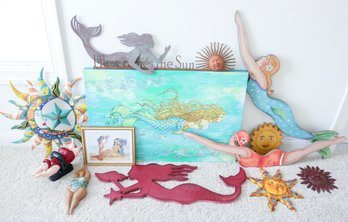 A Collection Of Mermaid Sun And Swimmer Decorator Objects