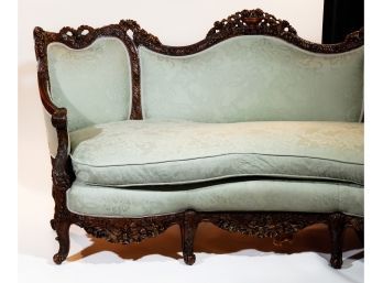 Victorian Heavily Carved Walnut Parlor Sofa