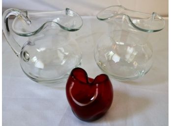 Three Pinched Blown Glass Vessels