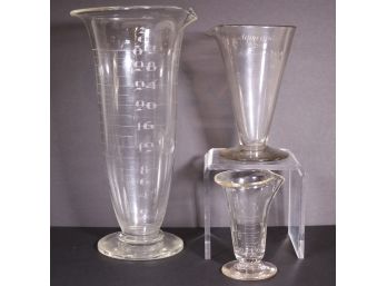 Group Of Three Antique Hand Blown And Etched Glass Apothecary Measuring Beakers