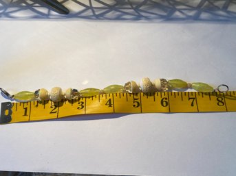 Locally Made Bracelet -limey Yellow And Cream Carved Beads