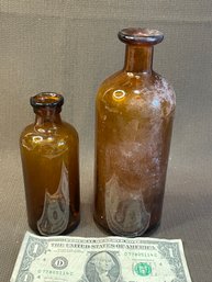 2 Vintage Amber Apothecary Bottles.