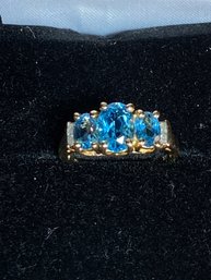 18K Blue Topaz And Diamond Ring