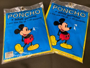 'vintage' Two Adult Disney Ponchos.