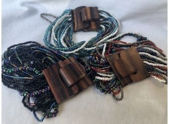 3 Multi Strand Beaded Bracelets With Wooden Clasps