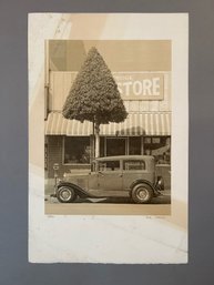 Vintage Photograph Of A Classic Car In Front Of A Store