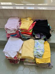 Assortment Of Clothing Including Tops And Bottoms. 60 Pieces (FFF)