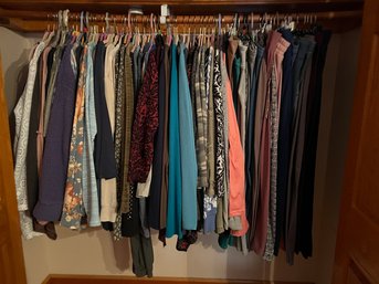 Rack Of Clothing Including Tops And Pants. (HH)