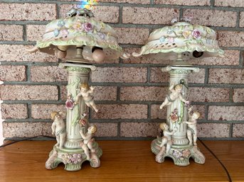 Pair Of Porcelain Cherub Lamps