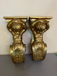 Pair Of Large  Composition Cherub Shelves