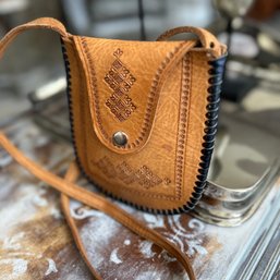 HANDMADE SMALL LEATHER TOOLED SHOULDER BAG LIKE NEW.