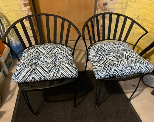 Two Heavy Wrought  Iron Chairs With Newer Cushions