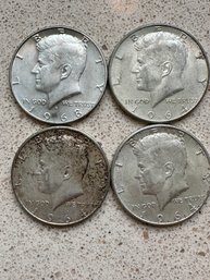 4 (Four) Kennedy Half Dollars 1964(3) 1967 - 42