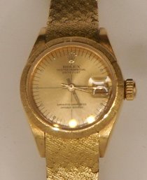 1- 18k Rolex Oyster Perpetual Datejust