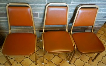 #B120 2 Orange Stacking Chairs