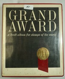 #41 Grand Award A Scott Album For Stamps Of The World  25- 30  Percent Full Or More