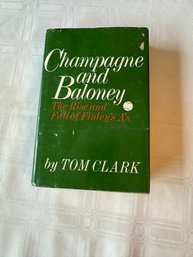 #57 First Edition Champagne And Baloney By Tom Clark