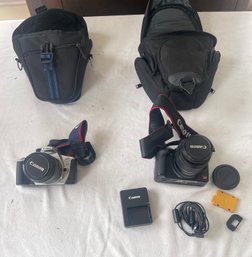 2 Canon Cameras With Cases